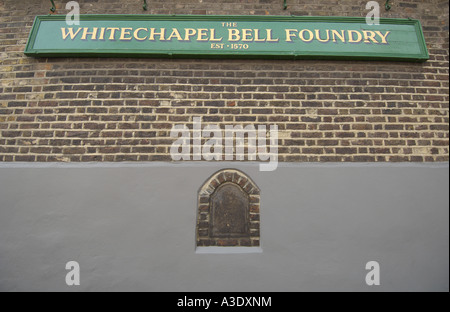 Old carved stone street sign saying 'This is Baynes Street 1746' on the side wall of Whitechapel Bell Foundry, London Stock Photo