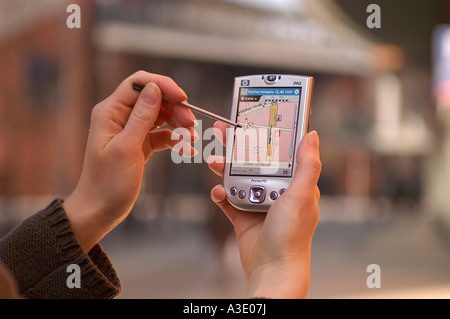 Pedestrian with navigation system Stock Photo