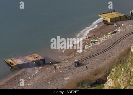 Pollution and wrecked containers from the ship MSC Napoli washed up on Branscombe beach Devon UK January 2007 Stock Photo