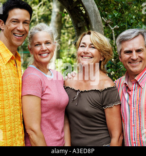 Portrait of two mature couples smiling Stock Photo