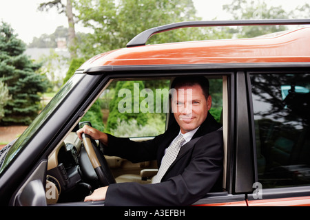 Portrait of a businessman sitting in a car Stock Photo