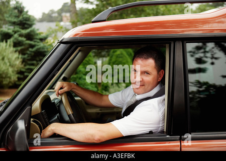 Portrait of a businessman sitting in a car Stock Photo