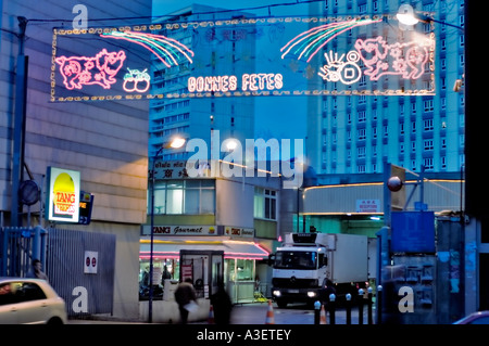 Paris France Street Scene, Scenic View, Chinatown Asian Food Store "Tang Freres" with New Years Decorations Lights "Lit up" at Night Stock Photo
