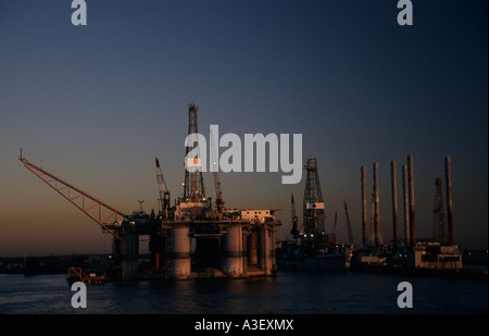 Oil Drilling Rigs on Mississippi River Louisiana America USA Stock Photo