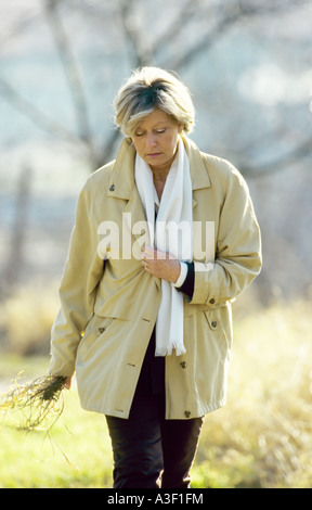 MR THOUGHTFUL MATURE WOMAN Stock Photo