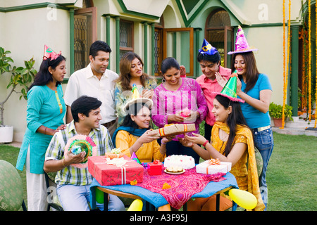 Group of people celebrating a birthday party Stock Photo