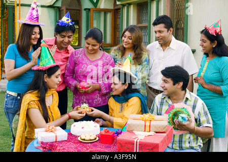 Group of people celebrating a birthday party Stock Photo