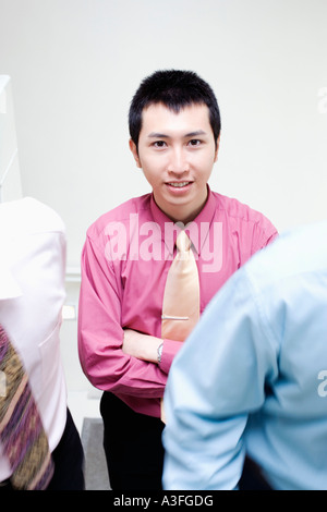 Portrait of a businessman smiling with his arms crossed Stock Photo