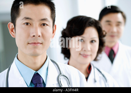 Portrait of two male doctors with a female doctor Stock Photo