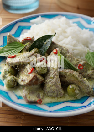 Thai beef green curry and rice on a plate editorial food Stock Photo