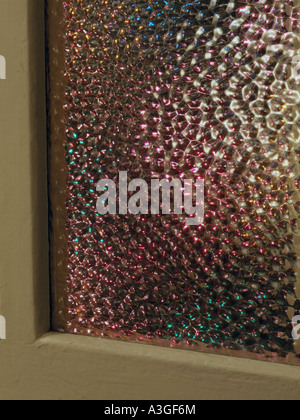 christmas tree lights through glass window Stock Photo