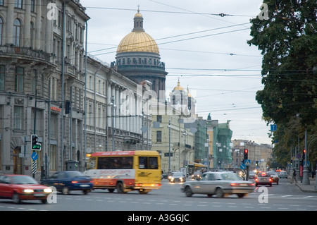 traffic whizzes by palace square in saint petersburg russia saint isaacs cathedral can be seen in the distance Stock Photo