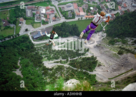 PICTURE CREDIT DOUG BLANE 2 way BASE Jumping off Magland France Stock Photo