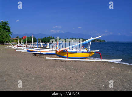 traditional fishing boats on the beach at lovina bali indonesia Stock Photo