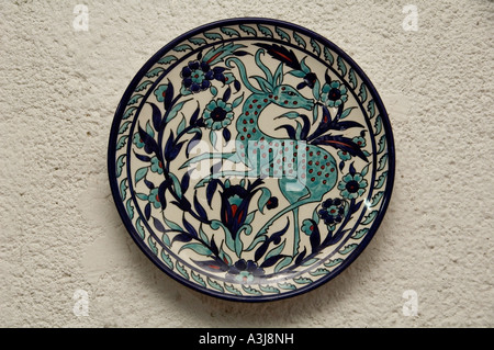 Hand painted Armenian ceramic for sale at an Armenian tile workshop East Jerusalem Israel Stock Photo