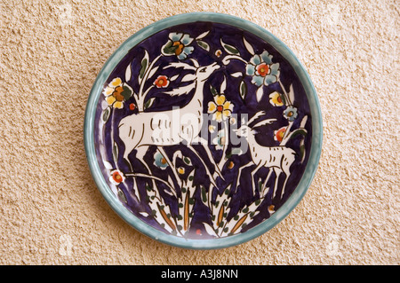 Hand painted Armenian ceramic for sale at an Armenian tile workshop East Jerusalem Israel Stock Photo