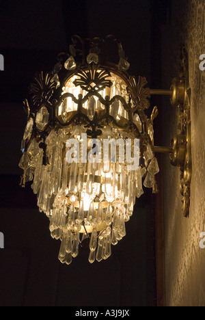 Elegant crystal chandelier of The Palace of the Parliament (Palatul Parlamentului) in Bucharest, Romania Stock Photo