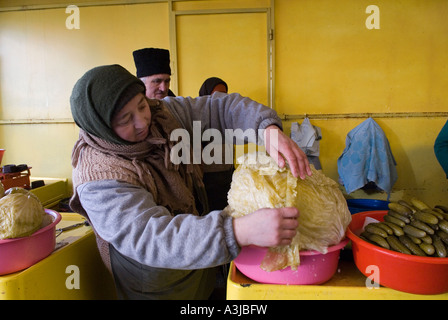 Vendors selling vegetables in the market in Pantelimon a working-class neighborhood located in south-eastern Bucharest Romania Stock Photo