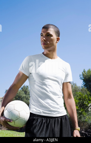 Portrait of Man with Soccer Ball Stock Photo