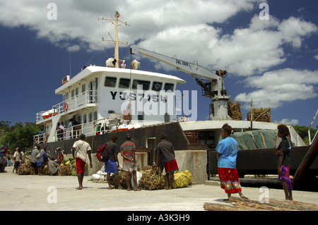 All supplies for Tanna Island in Vanuatu such as food drink and petrol come on this ship weekly from Efate island Stock Photo