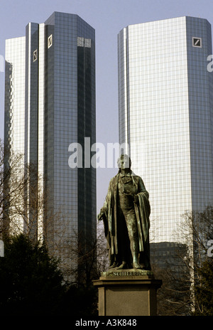 Statue of Schiller against the headquarters of the Deutsche Bank and corporate offices in Frankfurt, Germany Stock Photo