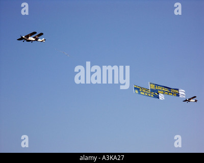 Three Aeroplanes towing Advertising Banners flying over La Cala de Mijas Beach, Mijas Costa, Malaga, Spain, Europe Stock Photo