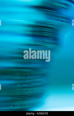 Blurry abstract close up of a stack of compact discs Stock Photo