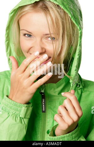 Young woman wearing raincoat Stock Photo