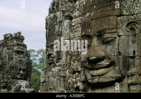 The smile of Angkor. Sculpted from stone, the smiling faces at Bayon temple are a symbol of Angkor, near Siem Reap, Cambodia. Stock Photo