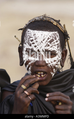 Young recently circumcised Masai Warrior in the Serengei Plains Tanzania Stock Photo