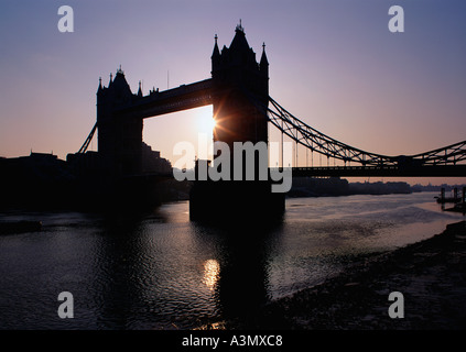 Tower Bridge silhouetted at sunrise London Great Britain Stock Photo
