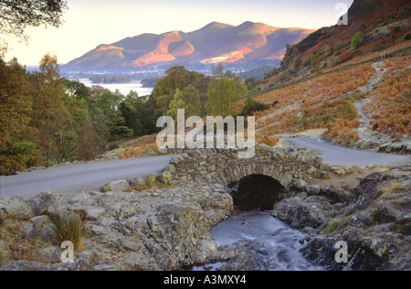 Ashness Bridge looking across to Derwent Water and Skiddaw, within the Lake District Stock Photo