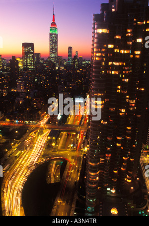 New York City Manhattan Empire State Building and Entrance to Queens Midtown Tunnel at Rush Hour Commuting Stock Photo