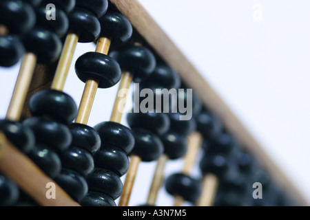 Old Chinese abacus or calculating device Stock Photo