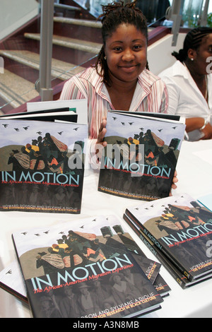 Miami Florida,Overtown,historic Lyric Theater,theatre,reception,Black woman female women,history book,books,FL060130578 Stock Photo