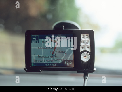 Satelite Navigator being used in a car Stock Photo