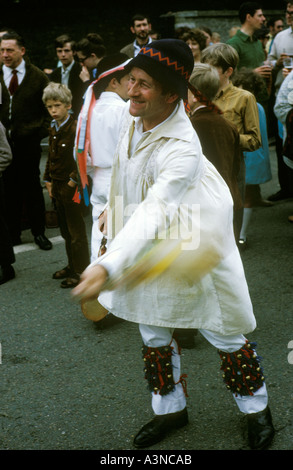 The Fool with a pigs bladder. Bampton Morris dancers dancing Oxfordshire England 1970s circa 1975 UK HOMER SYKES Stock Photo