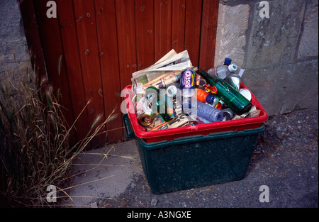 Recycling green box outside house waiting to be  collected, Bath Spa, Somerset, England UK Stock Photo