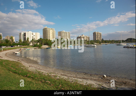 Small saillboats anchored off beach at Sarasota Bayfront Park in Sarasota Bay on the Gulf of Mexico in southwestern Florida Stock Photo