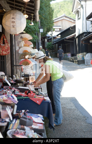 Two young women looking at souvenirs Stock Photo