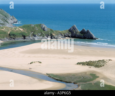 SANDY BEACH AT THREE CLIFFS BAY THE GOWER PENINSULA, WEST WALES UK Stock Photo
