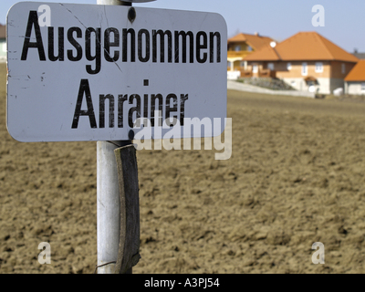 newly built houses in the country field sign Stock Photo