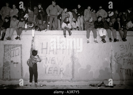 European History. New Year celebrations on the historical Berlin Wall in West Berlin in Germany in Europe during the Cold War.