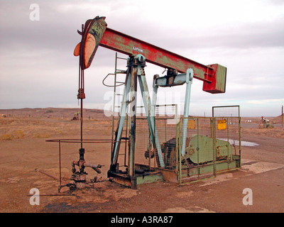 Elk Hills oil field near Coalinga California where the pumpers are painted like cartoon animals located area where endangered species live Stock Photo