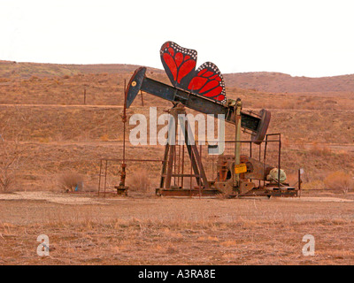 Elk Hills oil field near Coalinga California where the pumpers are painted like cartoon animals located area where endangered species live Stock Photo