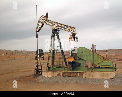 Elk Hills oil field near Coalinga California where the pumpers are painted like cartoon animals located area where endangered species live Stock Photo