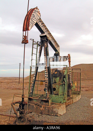 Elk Hills oil field near Coalinga California where the pumpers are painted like cartoon animals located area where endangered species live Stock Photo