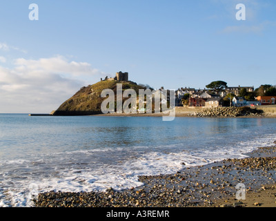 13th Century Castle on rocky headland from east beach in bay on Lleyn Peninsula Criccieth Gwynedd North Wales UK Stock Photo