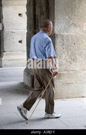 Old man walking with cane Stock Photo - Alamy
