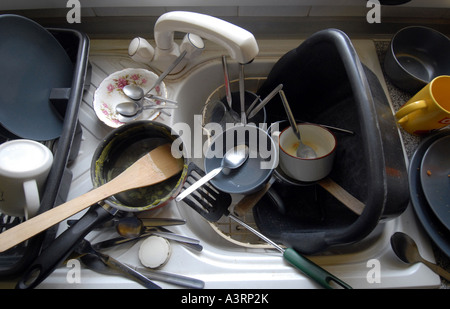 Dirty Pans washing up Stock Photo - Alamy